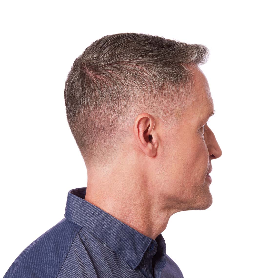 A Sterling micro RIC 312 on a man's ear